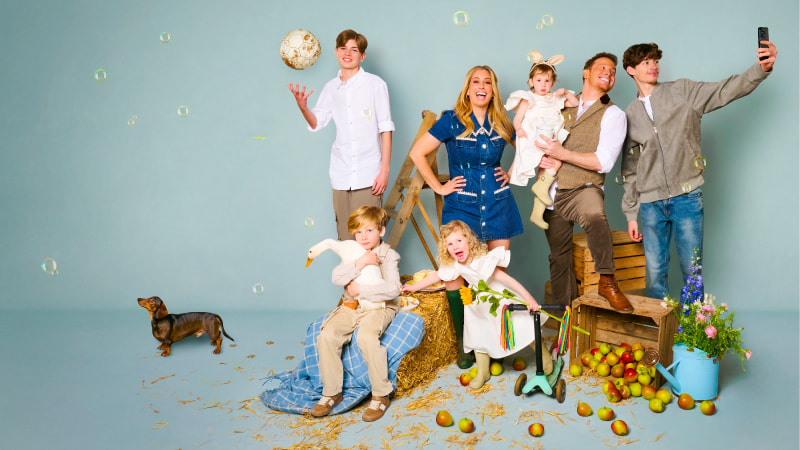 Stacey Solomon and husband Joe Swash are surrounded by their 5 children, sausage dog and pet goose.